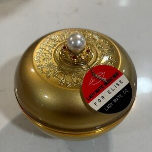 Vintage Lady Mate Musical Powder Box Gold Lucite Peg legs 1950’s